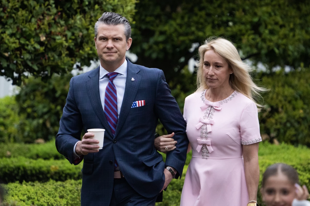 Defense Secretary Pete Hegseth and his wife, Jennifer, attend the White House Easter Egg Roll on April 21.