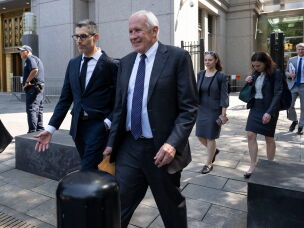 David McCraw, right, general counsel for the New York Times, and Douglas Zolkind, left, attorney for the New York Times, leave Manhattan federal court, Thursday, July 23, 2026, in New York.