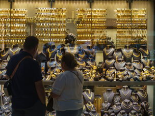 A couple looks at gold jewelry inside the Grand Bazaar in Istanbul, Turkey, on Aug. 26, 2026.
Turkish finance Minister Mehmet ÅžimÅŸek has said that about $640 billion in gold and foreign currency is held outside the financial system. For many Turkish savers, physical gold is still a safe way to protect their money from inflation and economic uncertainty. This practice is known as