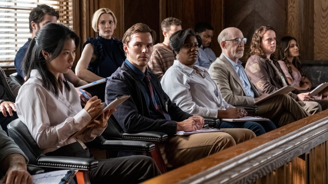 Nicholas Hoult (front row, center) plays Justin Kemp in Juror #2.