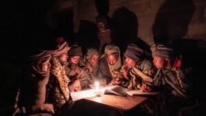 Shepherds attend a part time night school near Mokhotlong, Lesotho. For many, these classes, which occur roughly twice a month, are the only form of education they can access.