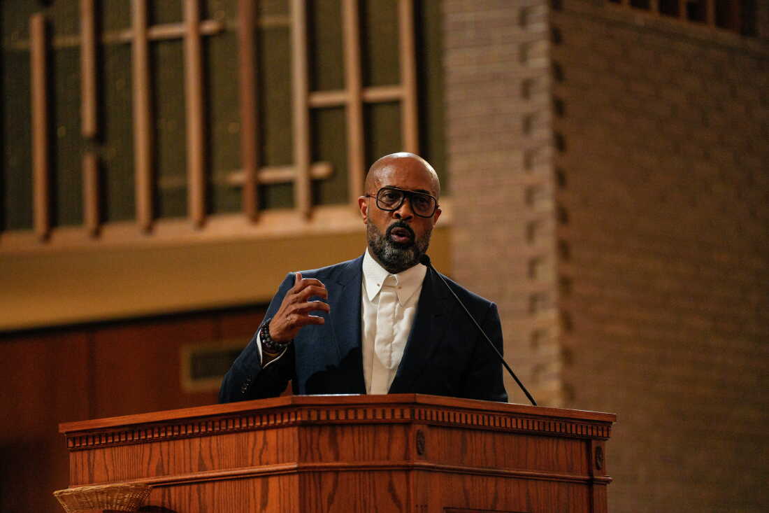 The Rev. Frederick Haynes III speaks to the crowd during the We the People TX interfaith service, "A Night of Moral Resistance," in Dallas in September.