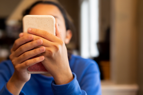 The study asked about signs of addiction to mobile phones, social media and video games. Those signs can include being preoccupied thinking about them and being unable to cut down on using them.