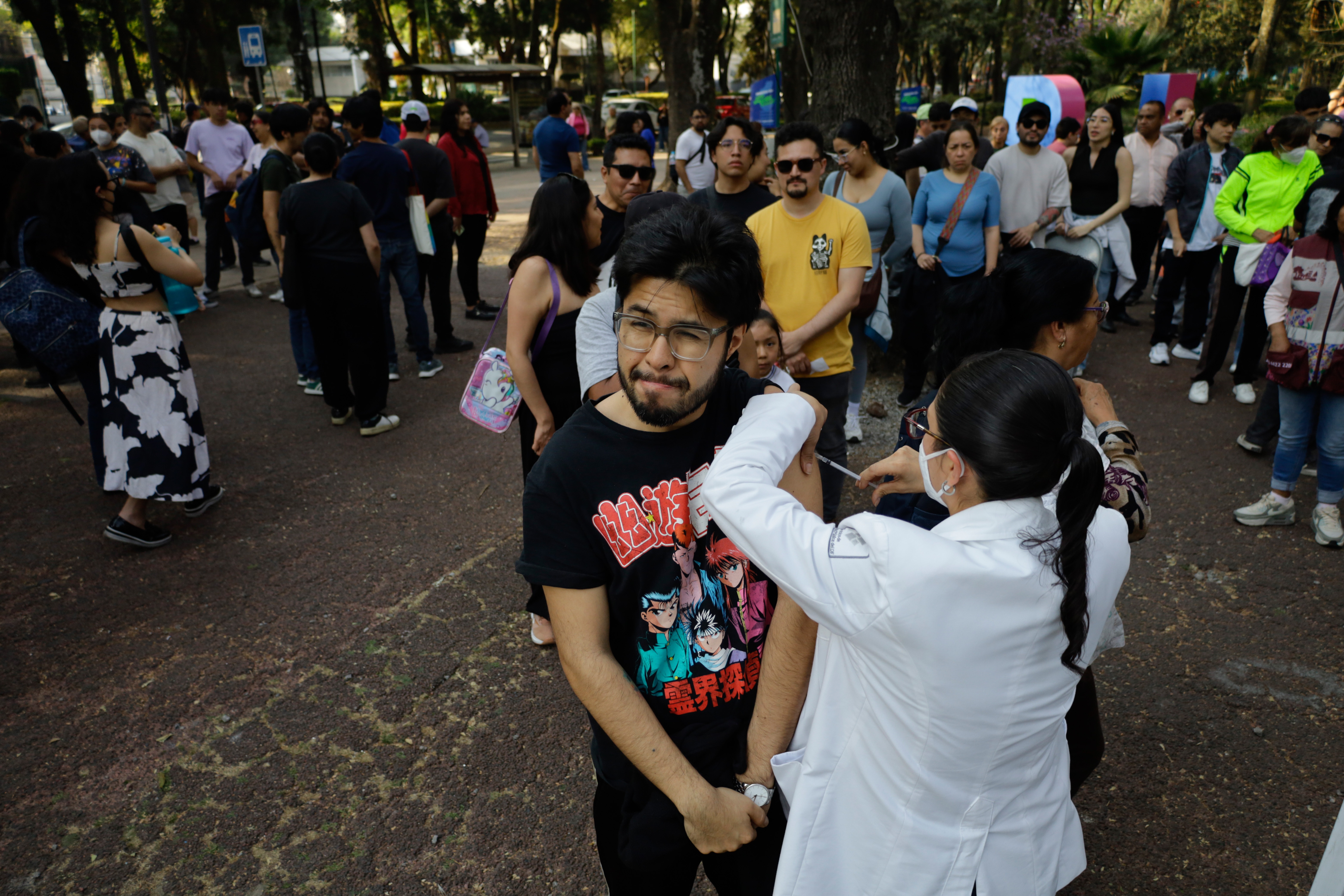 Medical personnel in Mexico City administer measles vaccines at a mass vaccination event on February 11.