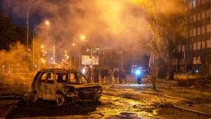 A burned car is seen after a Russian missile attack in Kyiv, Ukraine, Saturday, Aug. 1, 2026. (AP Photo/Dan Bashakov)