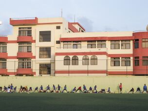 Pedro Bettencourt, president of the country's prestigious youth football training school known by its Portuguese acronym EPIF, says he's seen a change in young players since the national team's success. Here young players prepare for a practice.