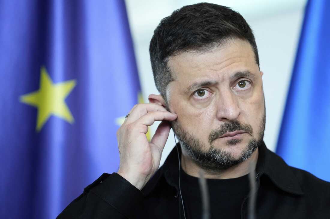 FILE - Ukrainian President Volodymyr Zelenskyy appears with German Chancellor Friedrich Merz following talks with European and U.S. leaders in Berlin, Germany, Wednesday, Aug. 13, 2025.