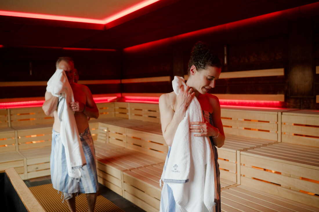 Sauna scientists Ashley Mason (right) and Dr. Hans Hägglund towel off after a sauna session in the Japanese sauna at The Well, Oslo, Norway.