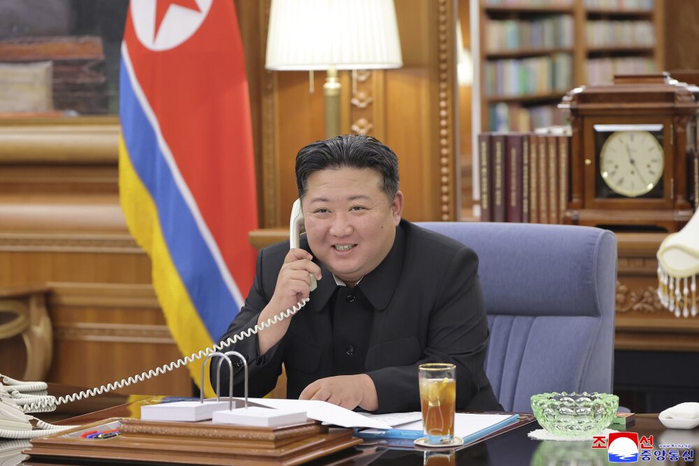 In this photo provided by the North Korean government, Kim Jong Un speaks with Russian President Vladimir Putin on the phone at an undisclosed location in North Korea, Aug. 12. Independent journalists were not given access to cover the event depicted in this image and its content cannot be independently verified. (Korea News Service via AP)