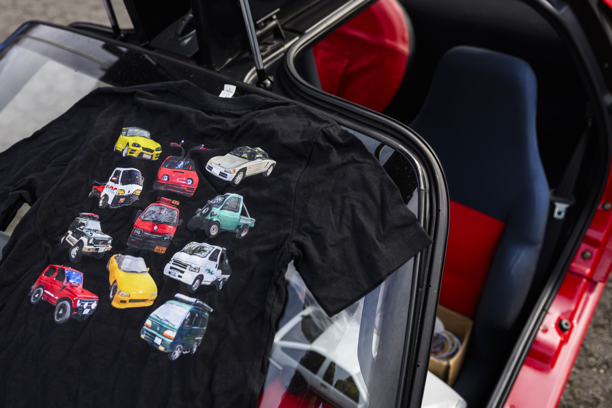 A shirt featuring a variety of kei cars was on display during a meeting of the Capital Kei Car Club.