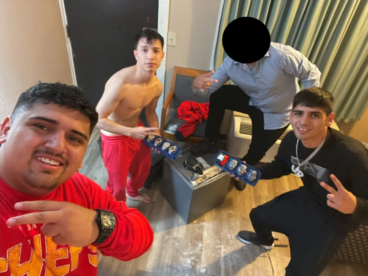 A photo from an FBI affidavit shows, from left, Pablo Zuniga Cartes, Ignacio Zuniga Cartes and Bastian Jimenez Freraut, along with an unidentified person whose face is redacted. The FBI says the image, procured from an iCloud account, was taken minutes after a Milwaukee Bucks player's home was burglarized.