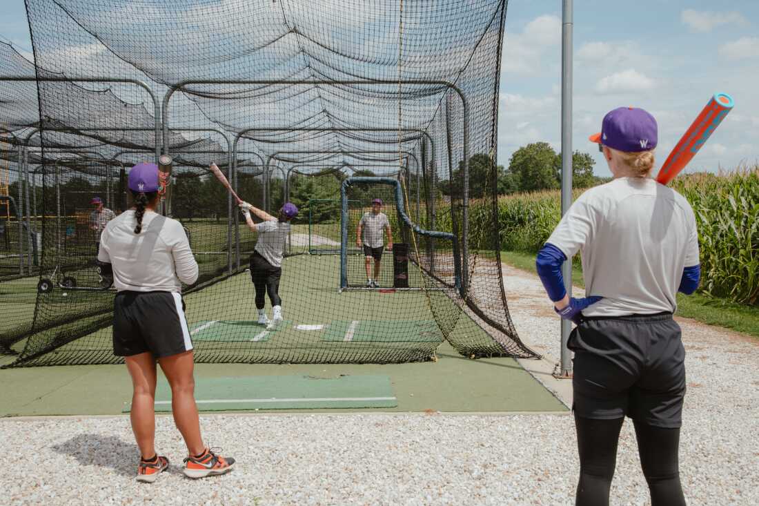 San Francisco Firebells players at batting practice at the University of Illinois - Springfield training field during preseason before the inaugural weekend of the Women's Pro Baseball League. Springfield, IL, July 30, 2026.