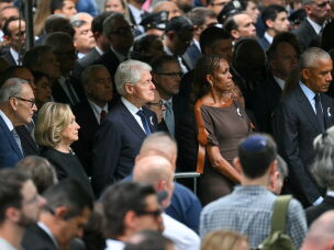 Senate Minority Leader Chuck Schumer, former Secretary of State Hillary Clinton, former President Bill Clinton, former First Lady Michelle Obama and former President Barack Obama attend the 25th anniversary commemoration of the Sept. 11 attacks at the 9/11 Memorial in New York on Friday.