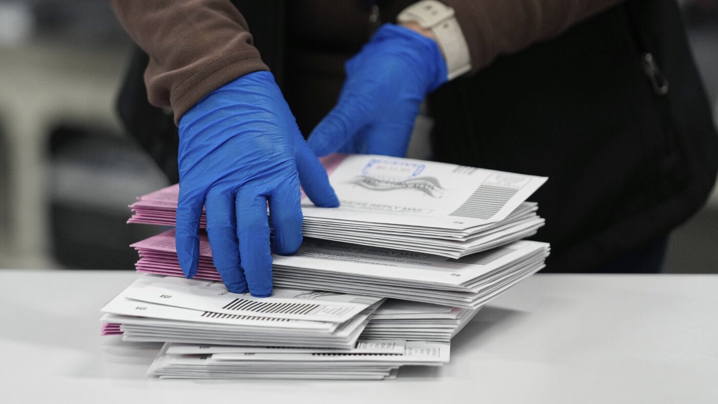 Trump tries to create verified voter checklist with govt order : NPR