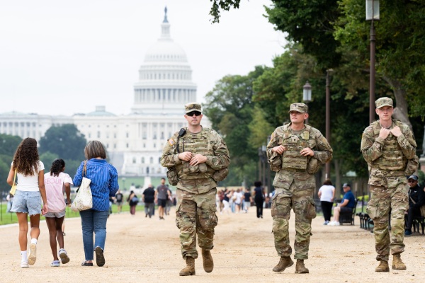 Members of the National Guard patrol on the National Mall near the U.S. Capitol in Washington, D.C., on Wednesday.