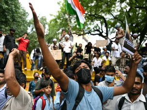 A Cockroach Janta Party (CJP) supporter shouts slogans at Jantar Mantar in New Delhi on July 23, 2026 during the ongoing protest to demand the resignation of India's Education Minister Dharmendra Pradhan.