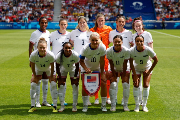 The U.S. women's soccer team poses before the start of the quarterfinal match against Japan last Saturday.