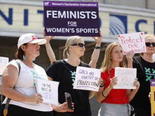 Demonstrators protest outside the United Center in Chicago prior to the game between the Chicago Sky and the Indiana Fever on Aug. 8, 2026.