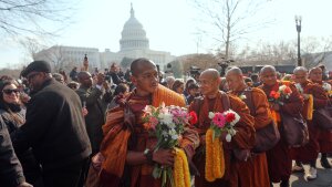 Buddhist monks walk near the U.S. Capitol, on Capitol Hill, during their Walk For Peace.