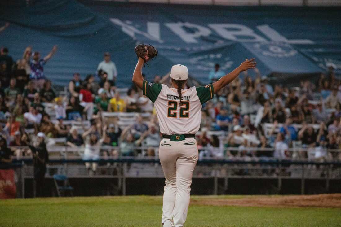 Sabrina Robinson, first basemen for the Boston Hunters, dances in between innings and riles up fans during her team's first game in the Women's Pro Baseball League. Springfield, IL, August 2, 2026.