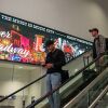 Travelers descend an escalator at Nashville International Airport, which has seen explosive growth over the past decade.