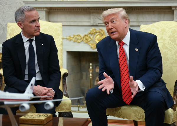 President Trump meets with Canadian Prime Minister Mark Carney in the Oval Office on May 6, 2025.