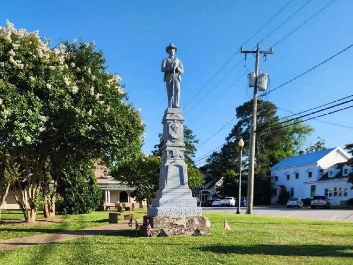 A Confederate statue in front of the courthouse in Columbia, N.C., with a plaque on the bottom that reads: “IN APPRECIATION OF OUR FAITHFUL SLAVES.”