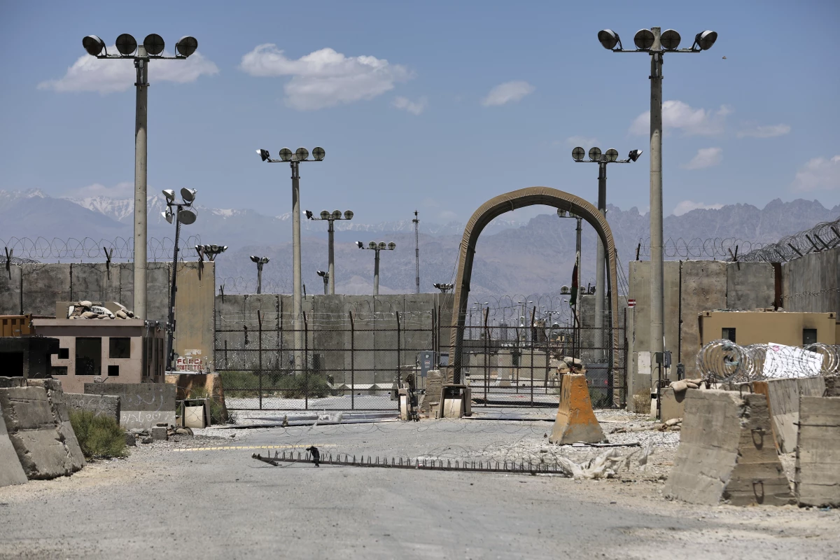 FILE - A gate is seen at the Bagram Air Base in Afghanistan, Friday, June 25, 2021. President Donald Trump has suggested he's working to reestablish a U.S. presence at Bagram Air Base in Afghanistan. That comes four years after America's chaotic withdrawal from the country left the base in the Taliban's hands.