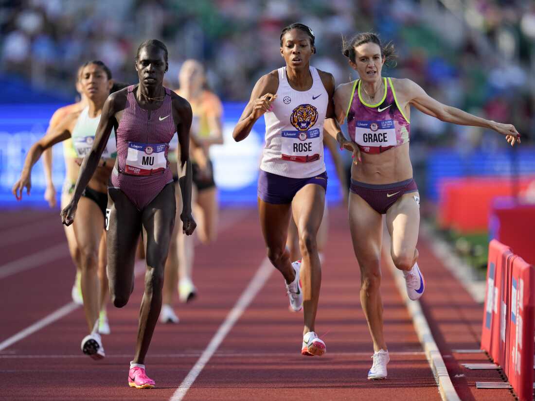 Ething Mu wins women's 800m semi-final heat as Kate Grace and Michaela Rose collide during Olympic trials.