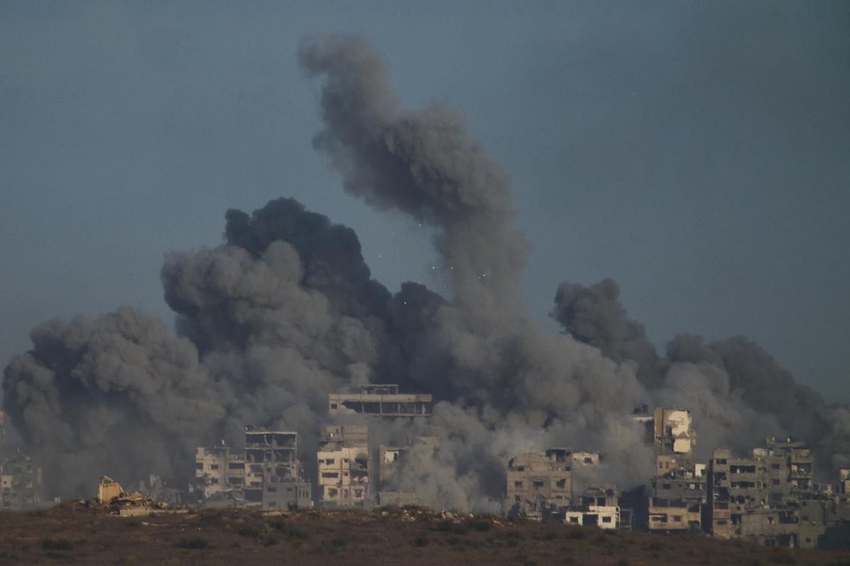 Smoke billows over Gaza Strip following an Israeli bombardment, as seen from southern Israel on Sunday.