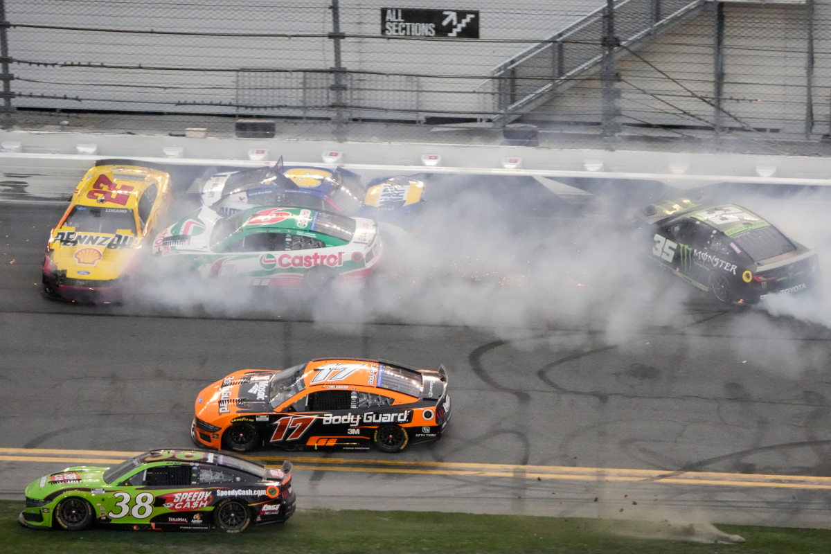 Cars crash on the checkered flag during the NASCAR Daytona 500 auto race at Daytona International Speedway, Sunday, Feb. 15, 2026, in Daytona Beach, Fla.