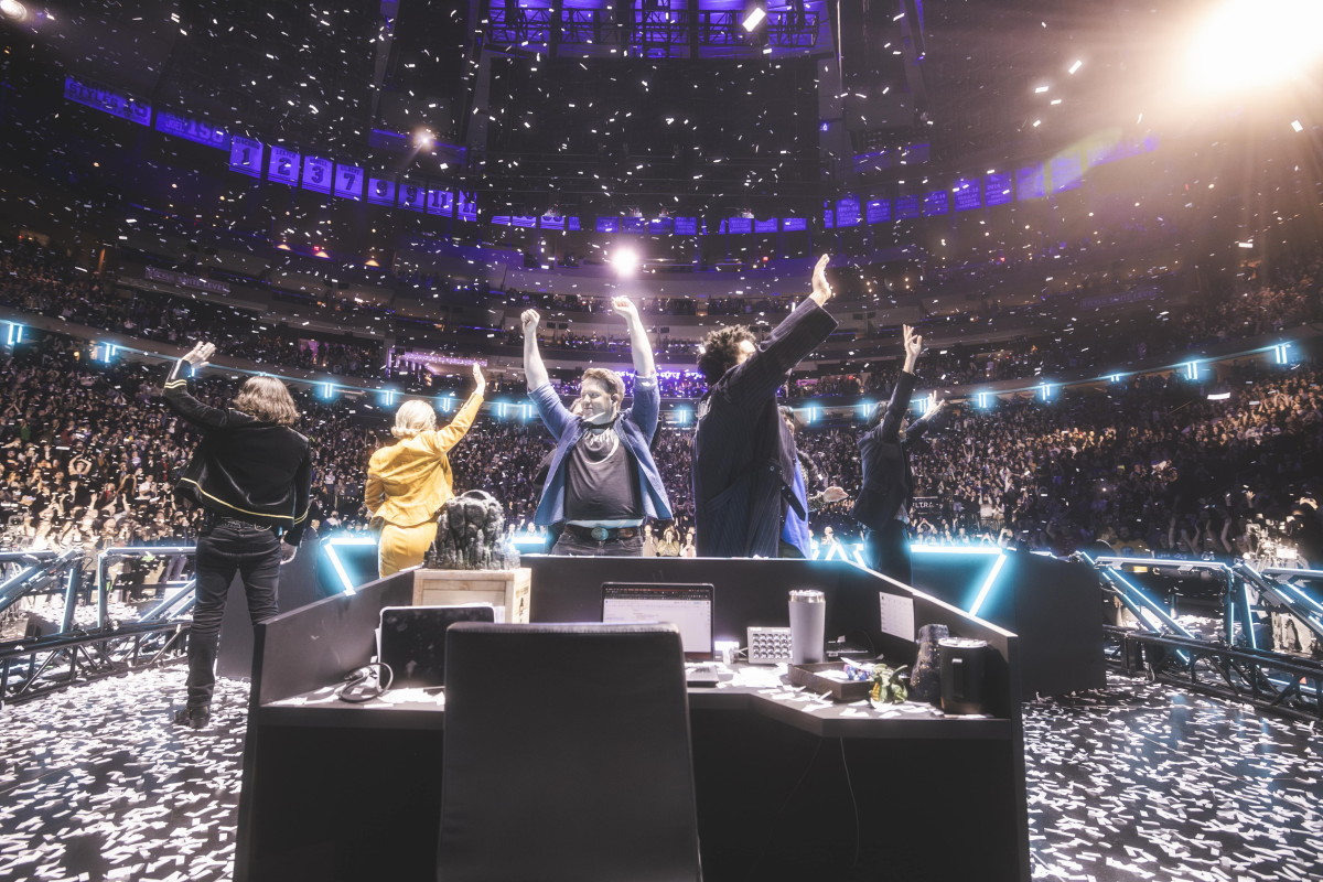 Dimension 20's main cast performing at Madison Square Garden in 2025. From left to right: Brian Murphy, Siobhan Thompson, Brennan Lee Mulligan, Lou Wilson, Emily Axford and Zac Oyama. Not pictured: Ally Beardsley.