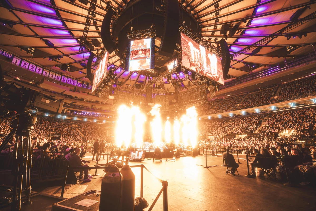 Flames shoot up during Dimension 20's sold-out Madison Square Garden show in January of 2025.