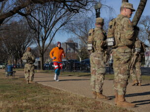 Members of the National Guard patrols along Constitution Ave. on December 01, 2025 in Washington, D.C.