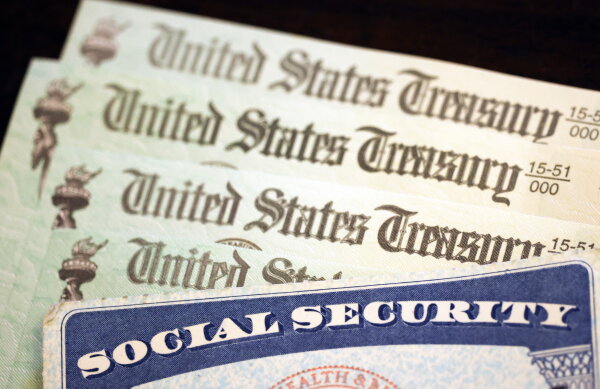 Social Security Cuts: What You Need to Know An elderly woman using a walker is assisted by a younger woman, highlighting the importance of Social Security benefits.