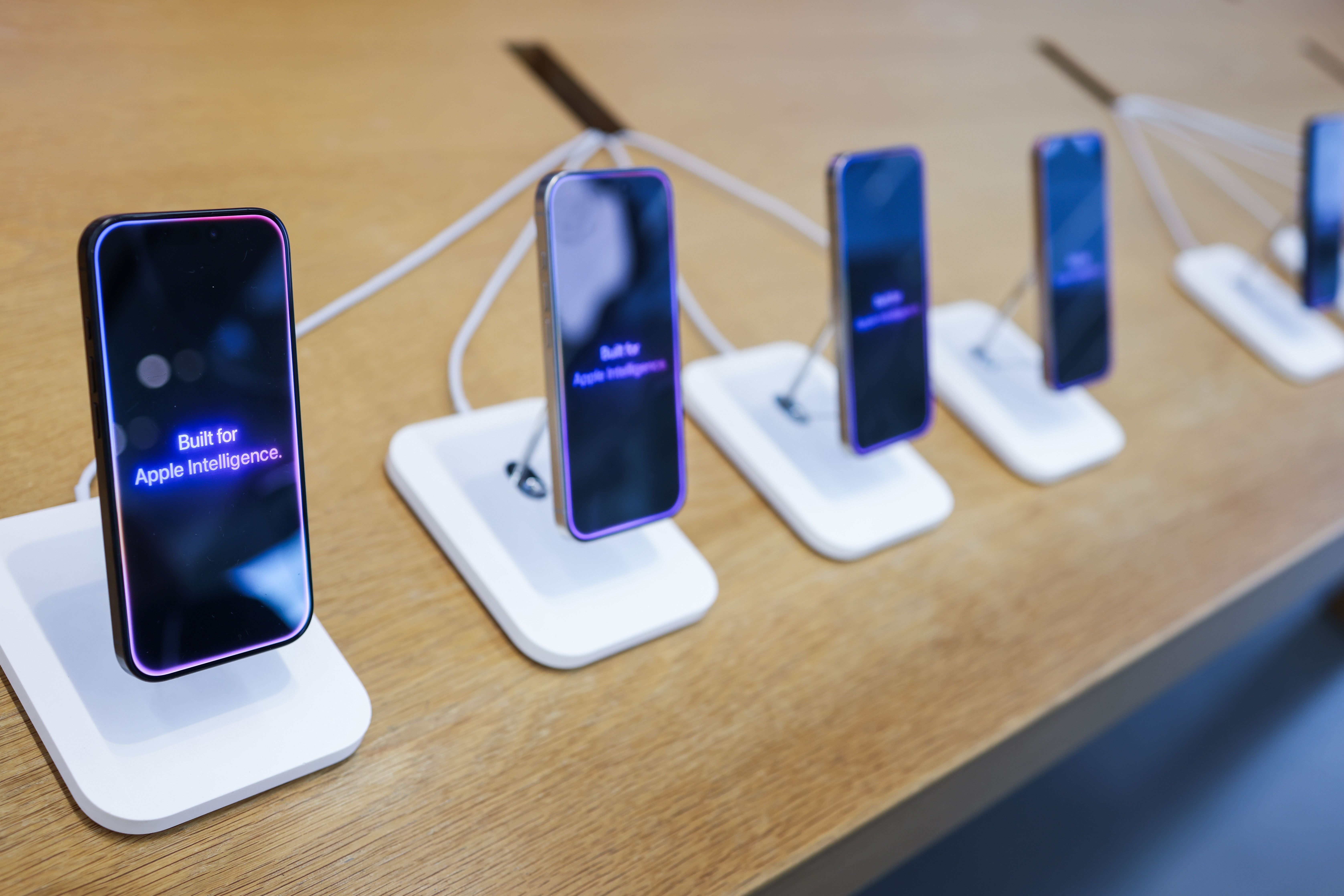 Versions of the new Apple iPhone 16 are displayed at an Apple store in in Manhattan Beach, Calif., on April 8.