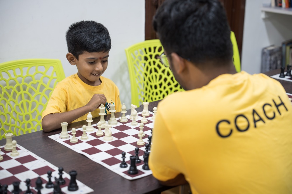 Seven-year-old Lakshan is coached by Selvabharathy, a trainer at Vishnu Prasanna's Chess Academy in Chennai, India in the southern state of Tamil Nadu — seen as the epicenter of chess in the country. A third of India's 88 grand masters are born in Tamil Nadu, whose chess schools make it, in the words of one chess coach, the "factory of Indian chess." (Viraj Nayar)
