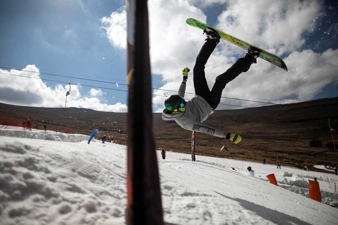A snowboarder performs a back flip at Afriski in the Maluti Mountains in Lesotho.