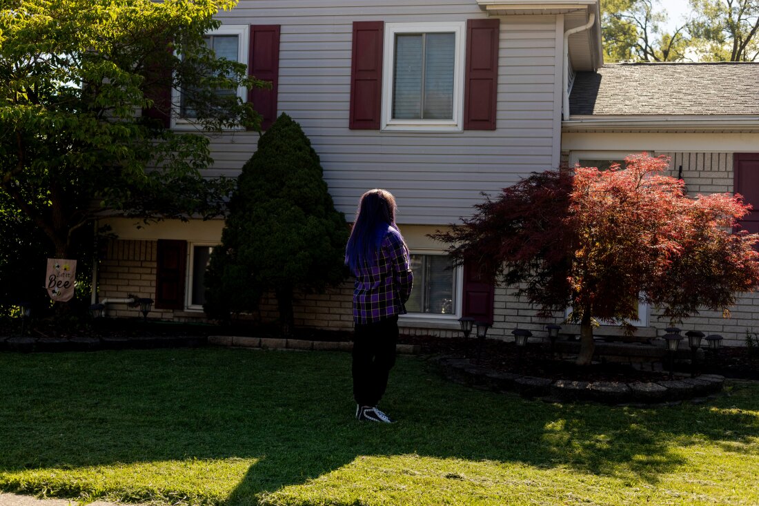 Randee Noggle stands in front of her home in Taylor, Mich. on June 30, 2024. She bought the house in 2018 using money she inherited from her grandmother.