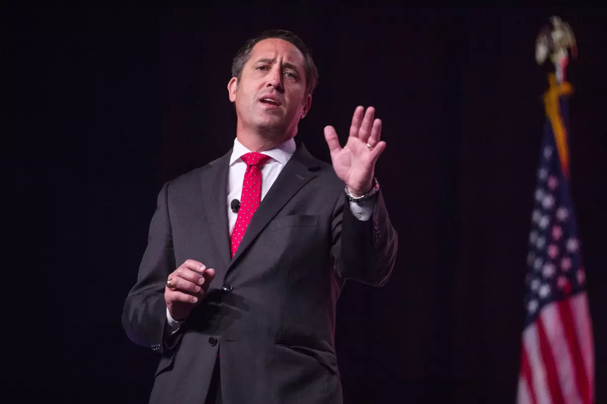 Former Comptroller Glenn Hegar speaking at the Texas Republican Convention in 2018. Hegar argued the new rule was simply clarifying existing state law so online marketplaces wouldn't become confused when they get audited.