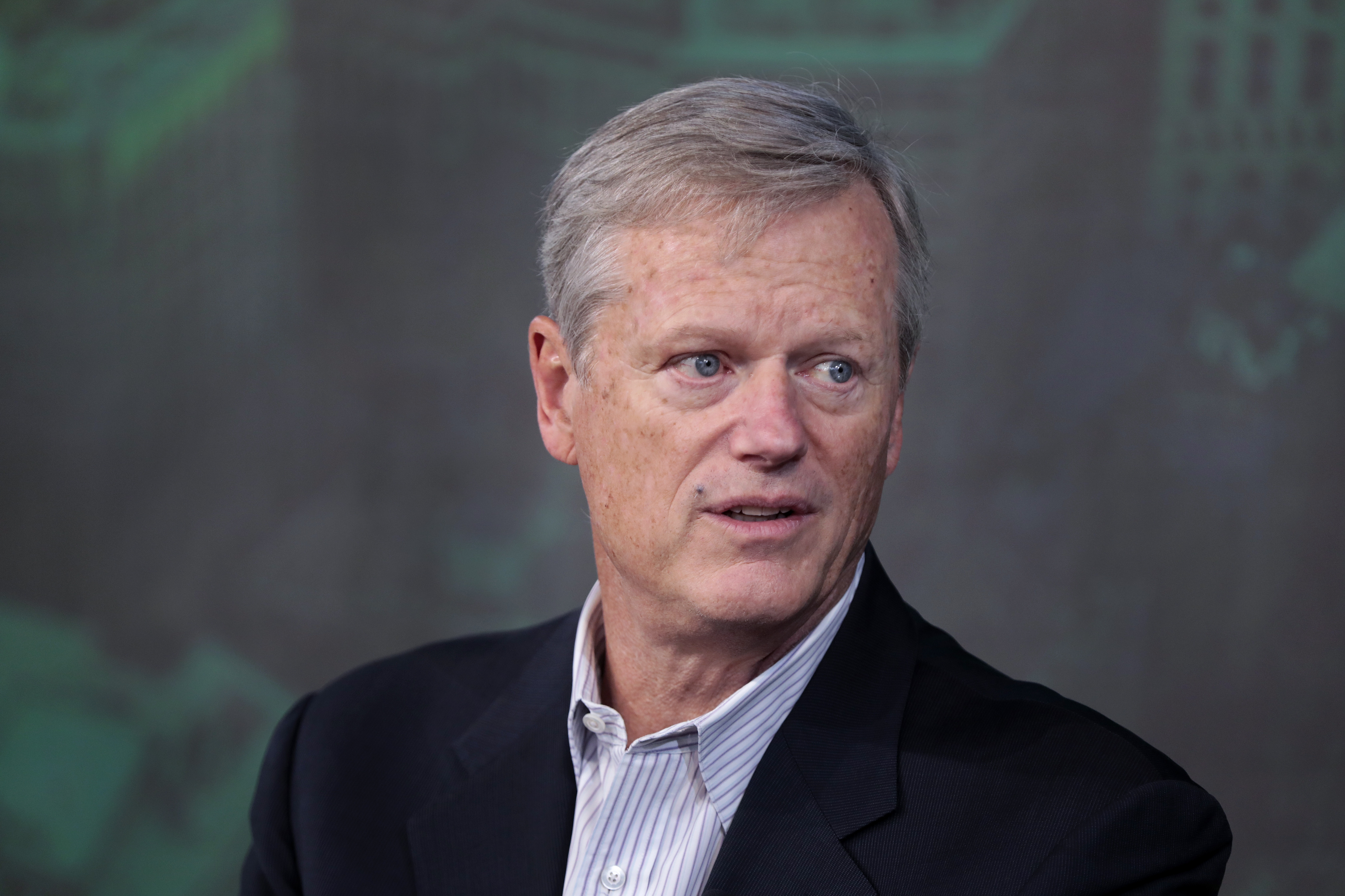 NCAA president and former Massachusetts governor Charlie Baker is interviewed by Boston Globe Sports writer Chris Gasper at the Globe Summit 2023.