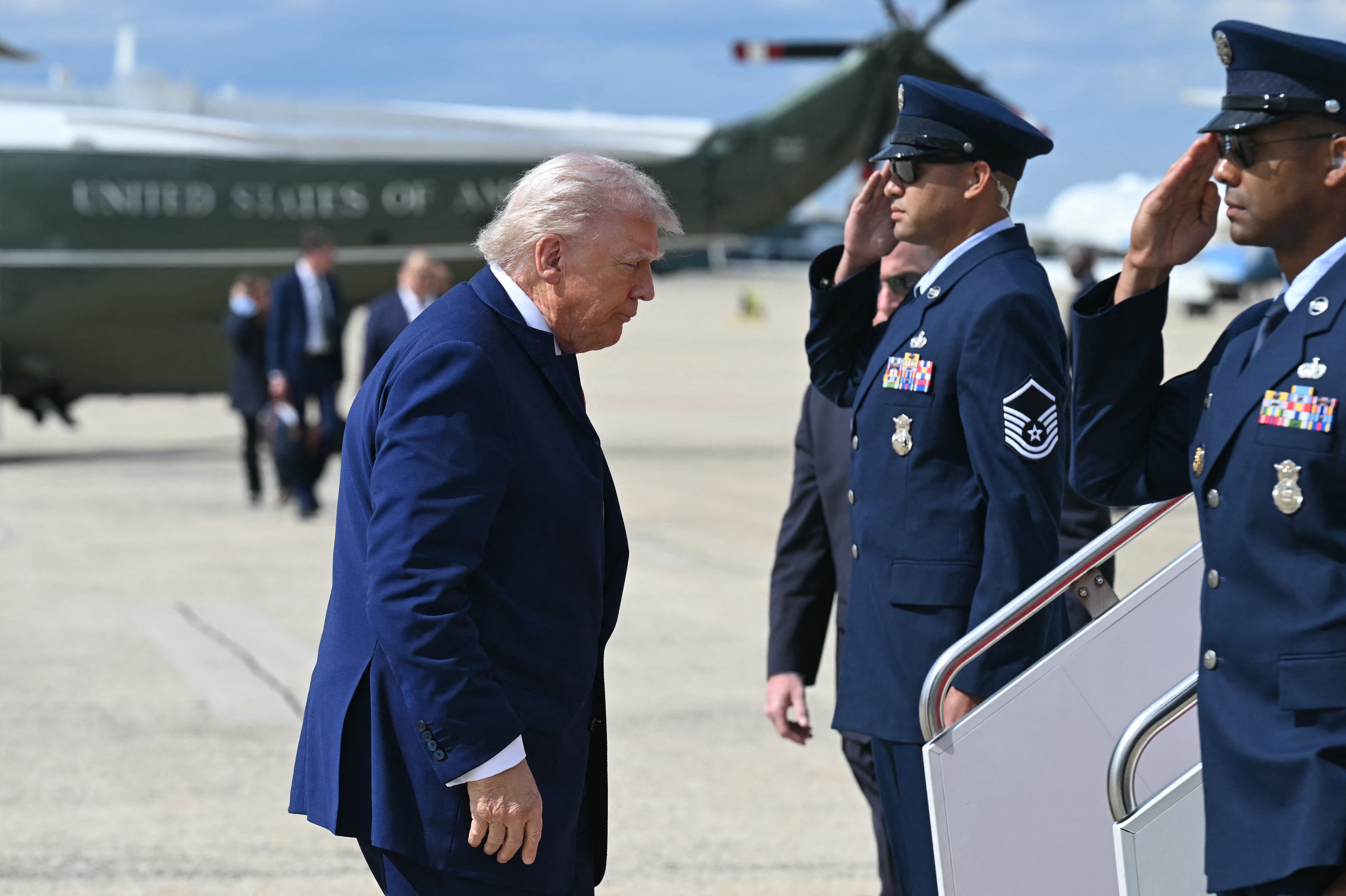 President Trump walks to board Air Force One prior to departure from Joint Base Andrews in Maryland on Friday en route to New Jersey for the weekend.