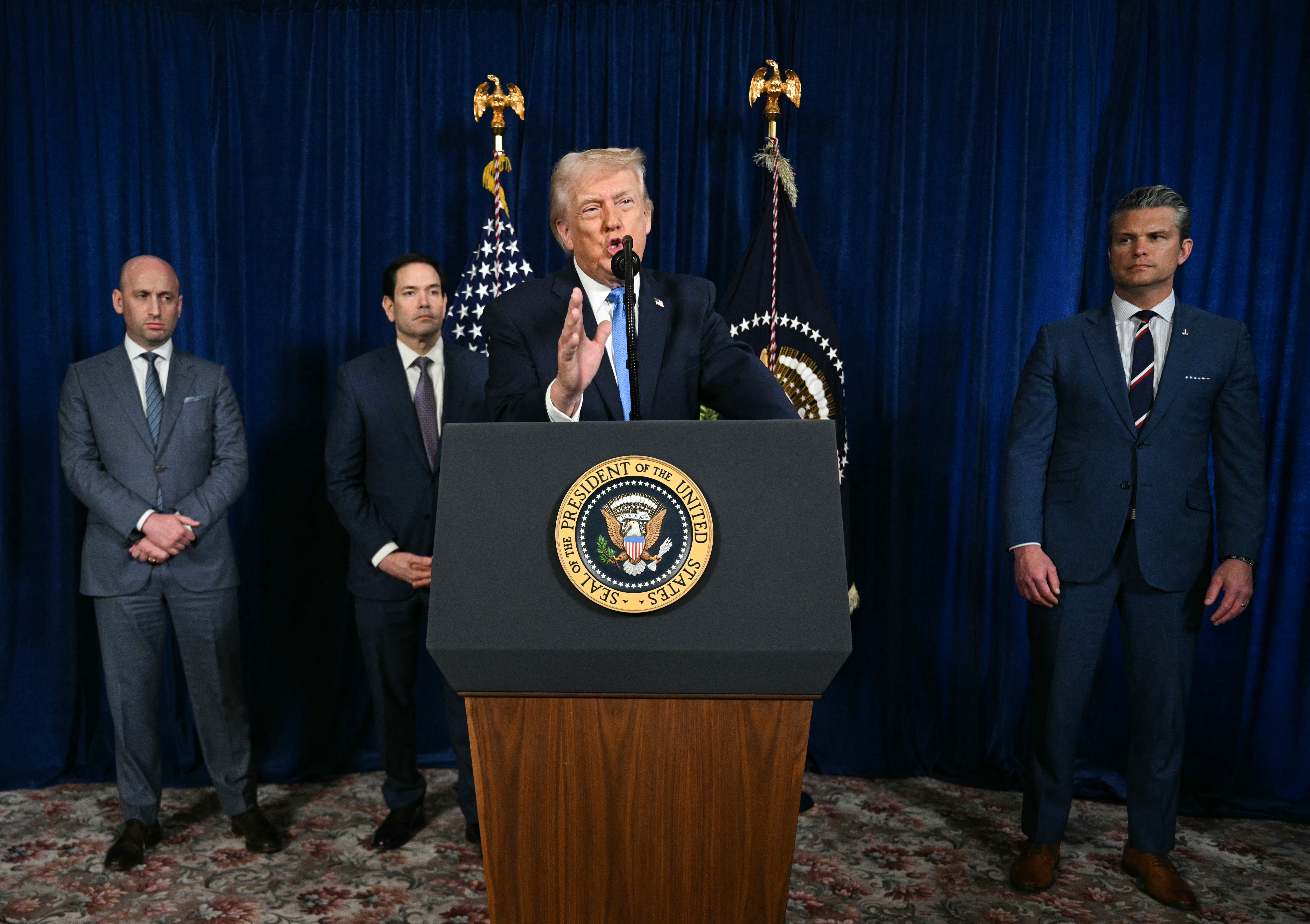 President Donald Trump, alongside (L/R) Deputy Chief of Staff Stephen Miller, Secretary of State Marco Rubio, and US Secretary of Defense Pete Hegseth, speaks to the media following US military actions in Venezuela, at his Mar-a-Lago residence in Palm Beach, Florida, on Jan. 3. (AFP)