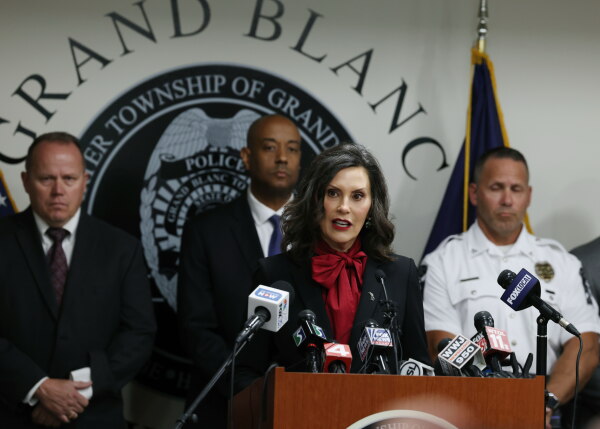 Michigan Gov. Gretchen Whitmer speaks to the media about the attack Sunday at the Church of Jesus Christ of Latter-day Saints in Grand Blanc Township, Mich.