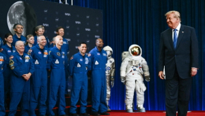 Astronauts look on as President Trump arrives to speak during a Congressional Space Medal of Honor presentation at NASA Lyndon B. Johnson Space Center in Houston, Texas, on Aug. 28, 2026.