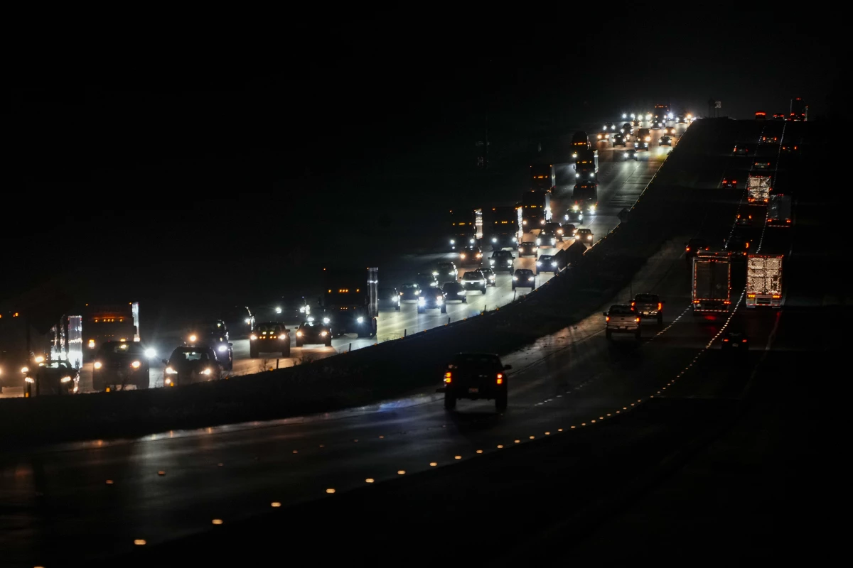 Heavy traffic flows northbound on Interstate 75 as people evacuate the Tampa Bay area ahead of Hurricane Milton's arrival late Monday, Oct. 7, 2024, in Ocala, Fla.