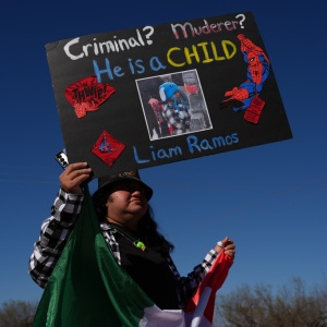 Protesters gather Jan. 28 outside the South Texas Family Residential Center detention facility where Liam Ramos and his father were being detained in Dilley, Texas.