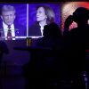 People watch the presidential debate between Vice President Harris and former President Donald Trump during a debate watch party at Penn Social on Sept. 10 in Washington, D.C.