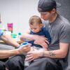A toddler receives the MMR vaccine at a vaccination clinic in Lubbock, Texas, during a measles outbreak in the state earlier this year.