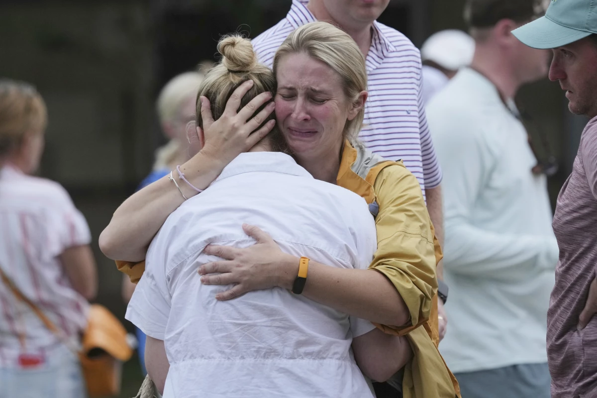 Families are reunited at a reunification center after flash flooding hit the area  in Ingram, Texas